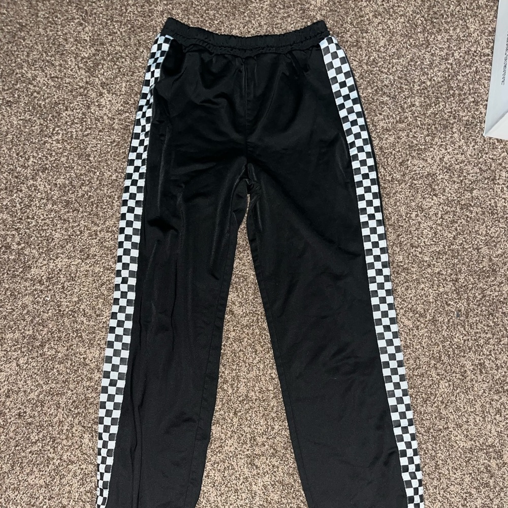 Size-medium color-black with checkers brand- forever 21